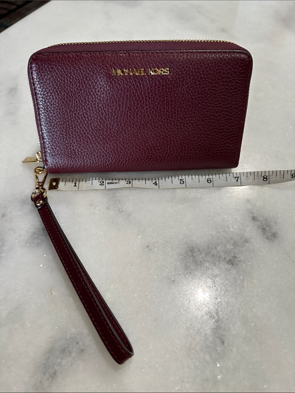 Michael Kors Pebbled Leather Wristlet in Burgundy with Gold Hardware